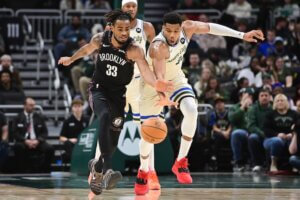 Giannis goes after a loose ball.