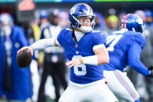 Jaxson Dart throws the football for the Giants.