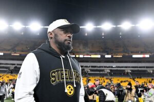 Mike Tomlin walks off the field for the Pittsburgh Steelers.