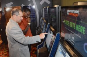 Wayne Cherbet pushing a sports betting tab.
