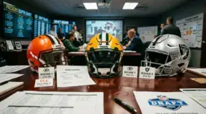 NFL team helmets on desk representing Jets running back trade destinations