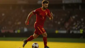 Belgium player attacking during 2026 World Cup match at Los Angeles Stadium