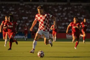 Croatia soccer players in checkered jerseys attacking against Panama at BMO Field World Cup match