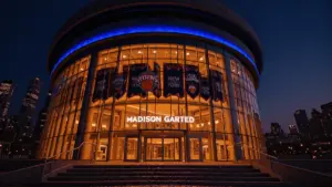 Madison Square Garden illuminated at night with New York Knicks championship celebration atmosphere