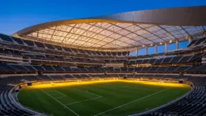 SoFi Stadium illuminated at dusk for World Cup 2026 soccer match between Iran and New Zealand