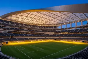 SoFi Stadium illuminated at dusk for World Cup 2026 soccer match between Iran and New Zealand