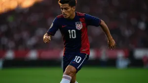 Christian Pulisic in USA jersey during World Cup action against Australia