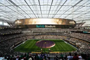 Interior view of SoFi Stadium during a soccer match with spectators.