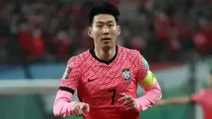 Son Heung-min in South Korea national team jersey during a football match.