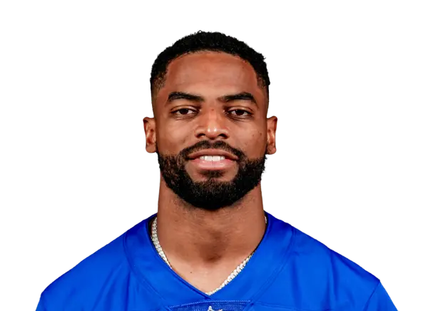Darius Slayton, a receiver for the New York Giants, smiles in his team jersey.