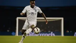 England striker shooting during World Cup knockout match at stadium