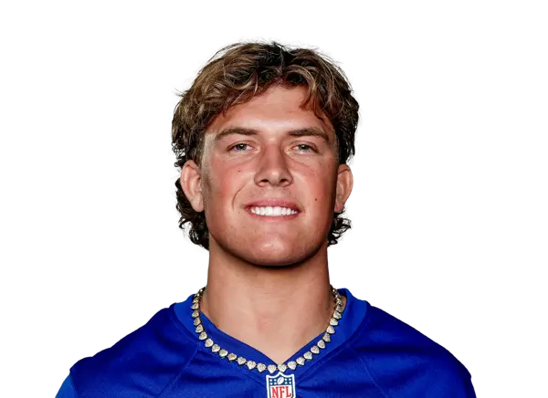 Portrait of a young male football player in a blue jersey with an NFL logo.